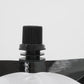 Close-up of the resealable screw cap on a COLDBRUH cold brew pouch